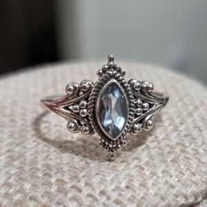 Elegant Silver Ring with Blue Topaz Gemstone